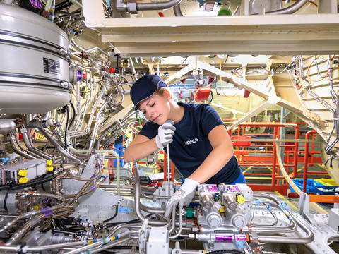 Young woman working as apprentice in Germany