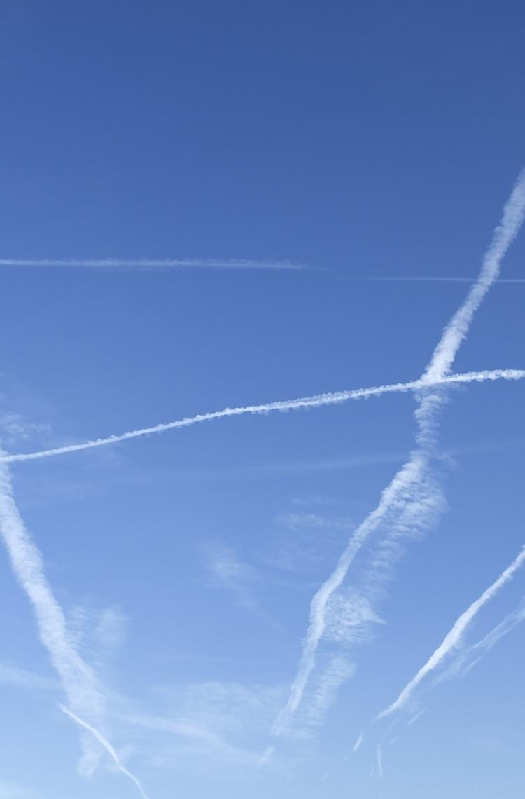 contrails on blue sky contrails on blue sky